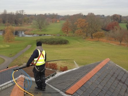 Soft Washing of a roof using AlgoClear: for long lasting moss and lichen clearance -  All roof cleaning Services by Roof Repairs Belfast,  Northern Ireland