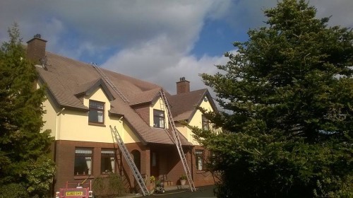 Roof cleaning - using soft washing - in  Belfast, NI by Roof Repairs Belfast