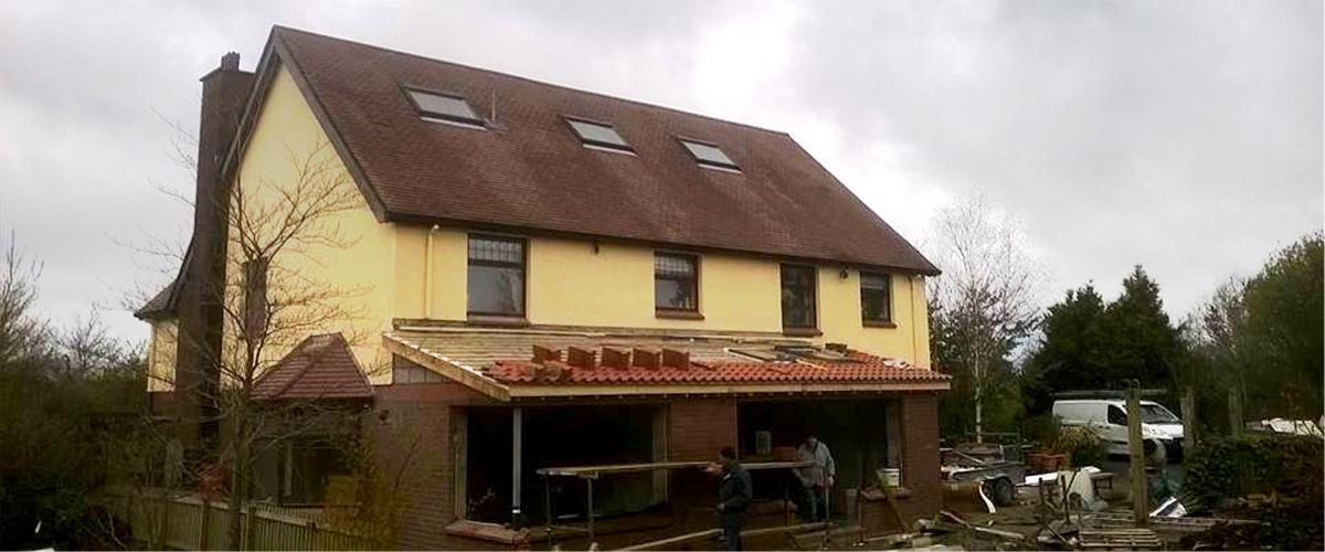 New roofing tiles being laid on an extension by Roof Repairs Belfast, Northern Ireland